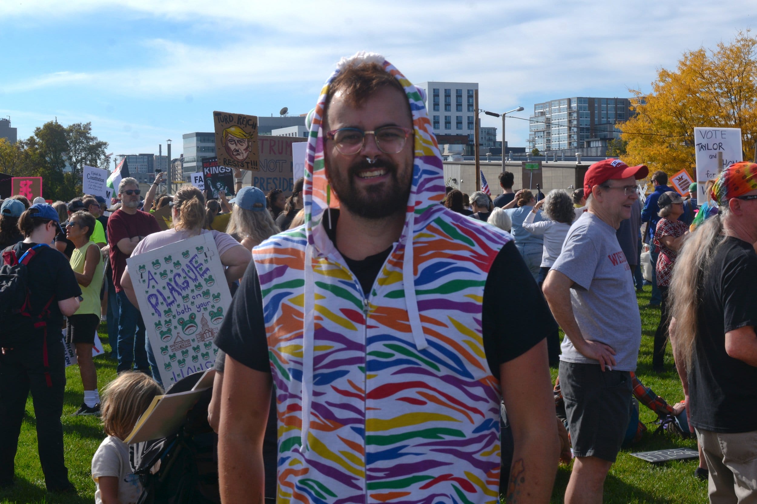  Michael Bergemann stands in front of crowd at McPike Park during the Madison No Kings event.  (Alys Brooks)  
