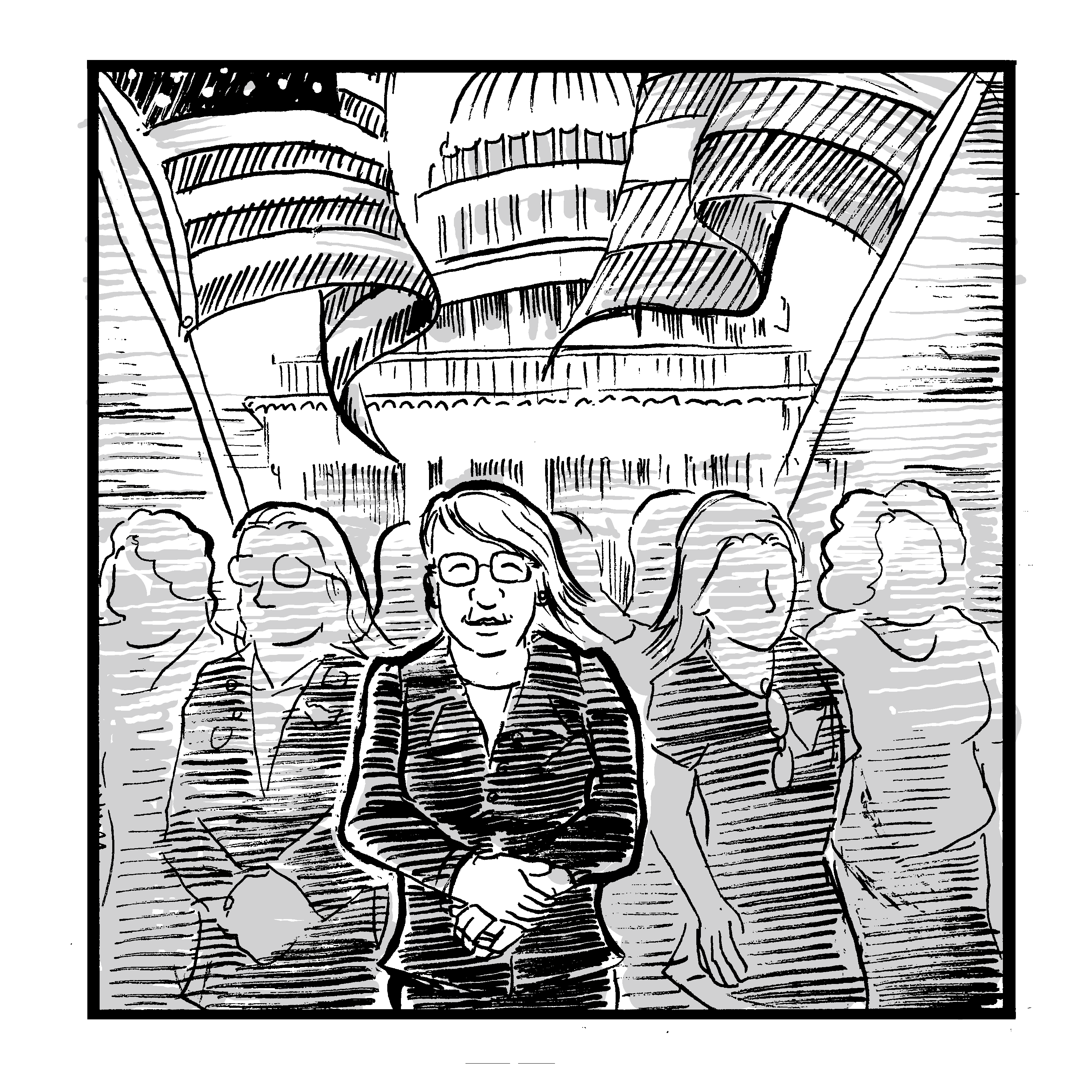 A mid-40s Monica Helms stands in front of a crowd of trans women, smiling at the viewer. The American and trans pride flags are flying behind her, and the US Capitol building is visible in the background behind them.