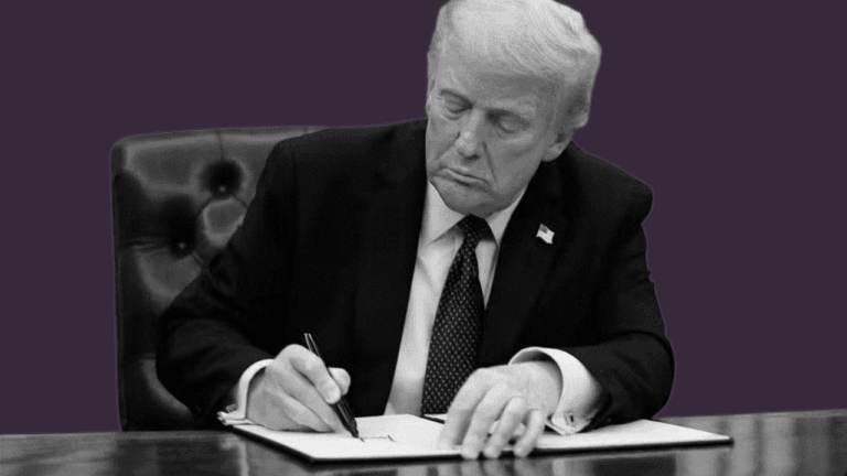 Donald Trump signing a document at his oval office desk against a dark plum background