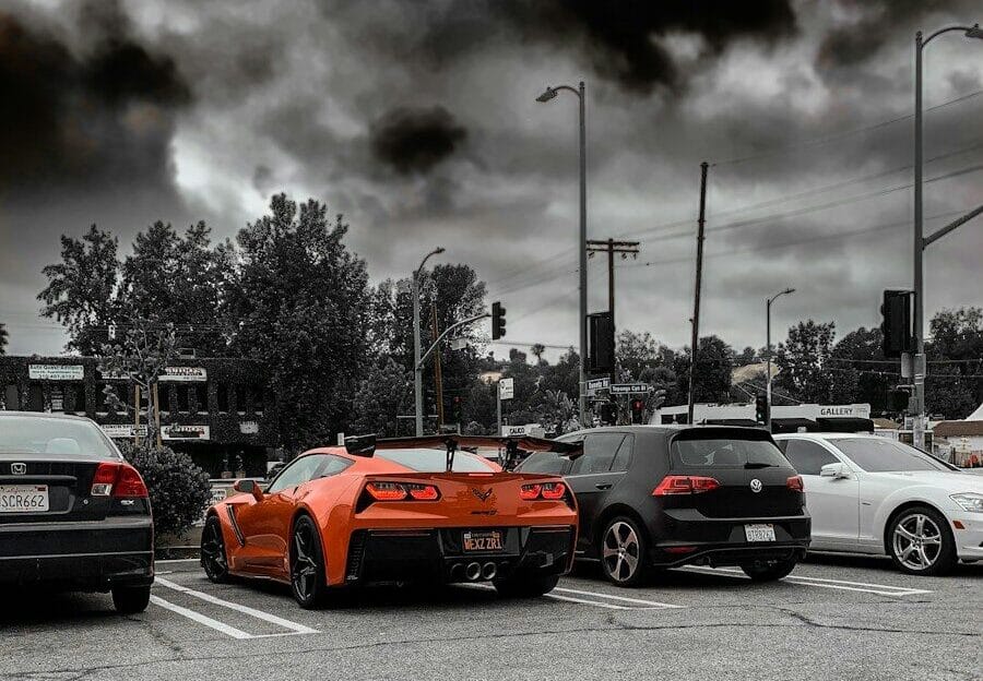 a group of cars parked in a parking lot